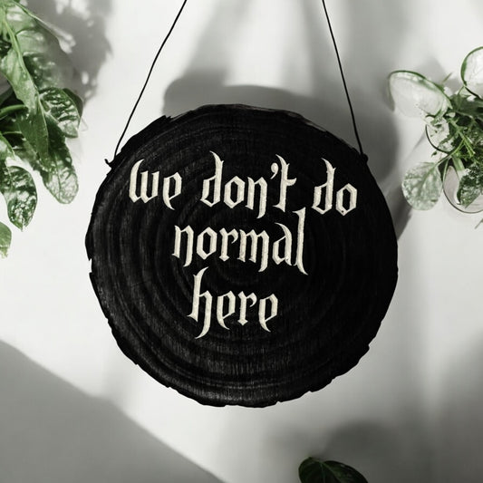 We Don’t Do Normal Here Sign